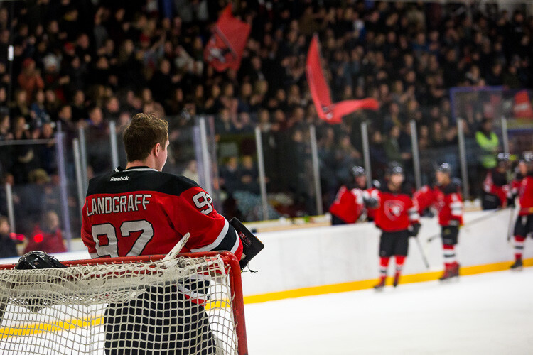 An unbalanced image of a hockey goaltender - Tips for Editing Hockey Photos in Lightroom