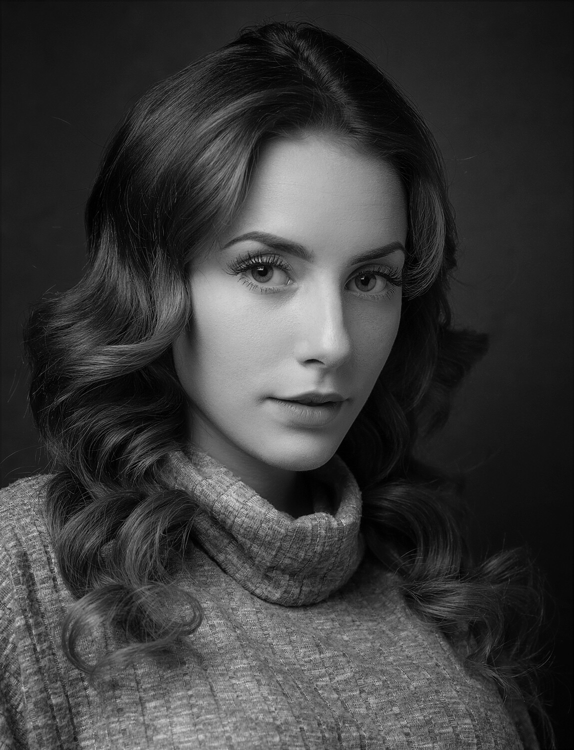 black and white headshot of a woman