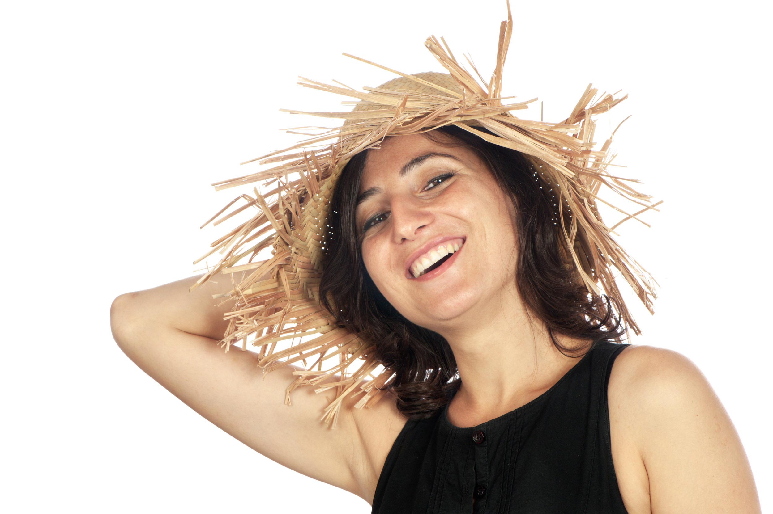 woman wearing a straw hat front light photography