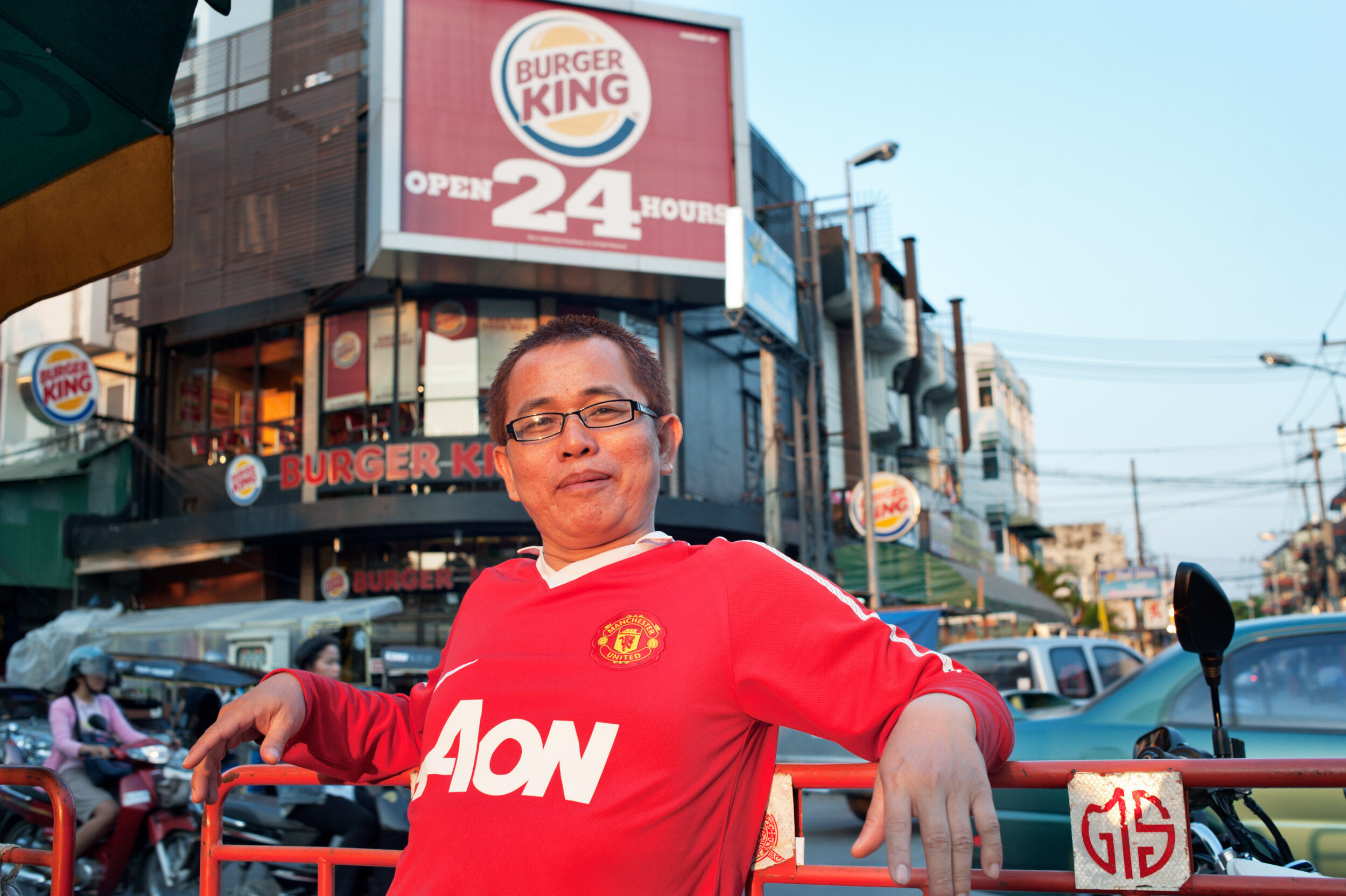 man at the market during golden hour front light photography