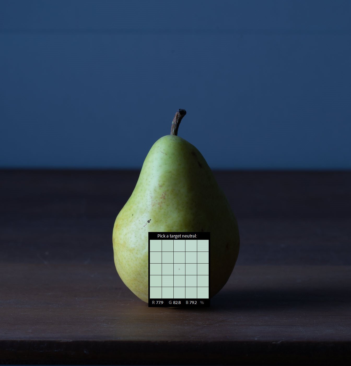 hoving the Eyedropper tool over the subject